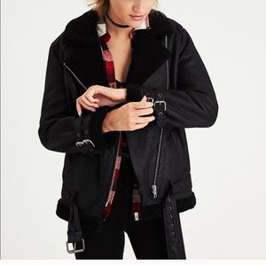 Black Sherpa motto jacket. AMERICAN EAGLE